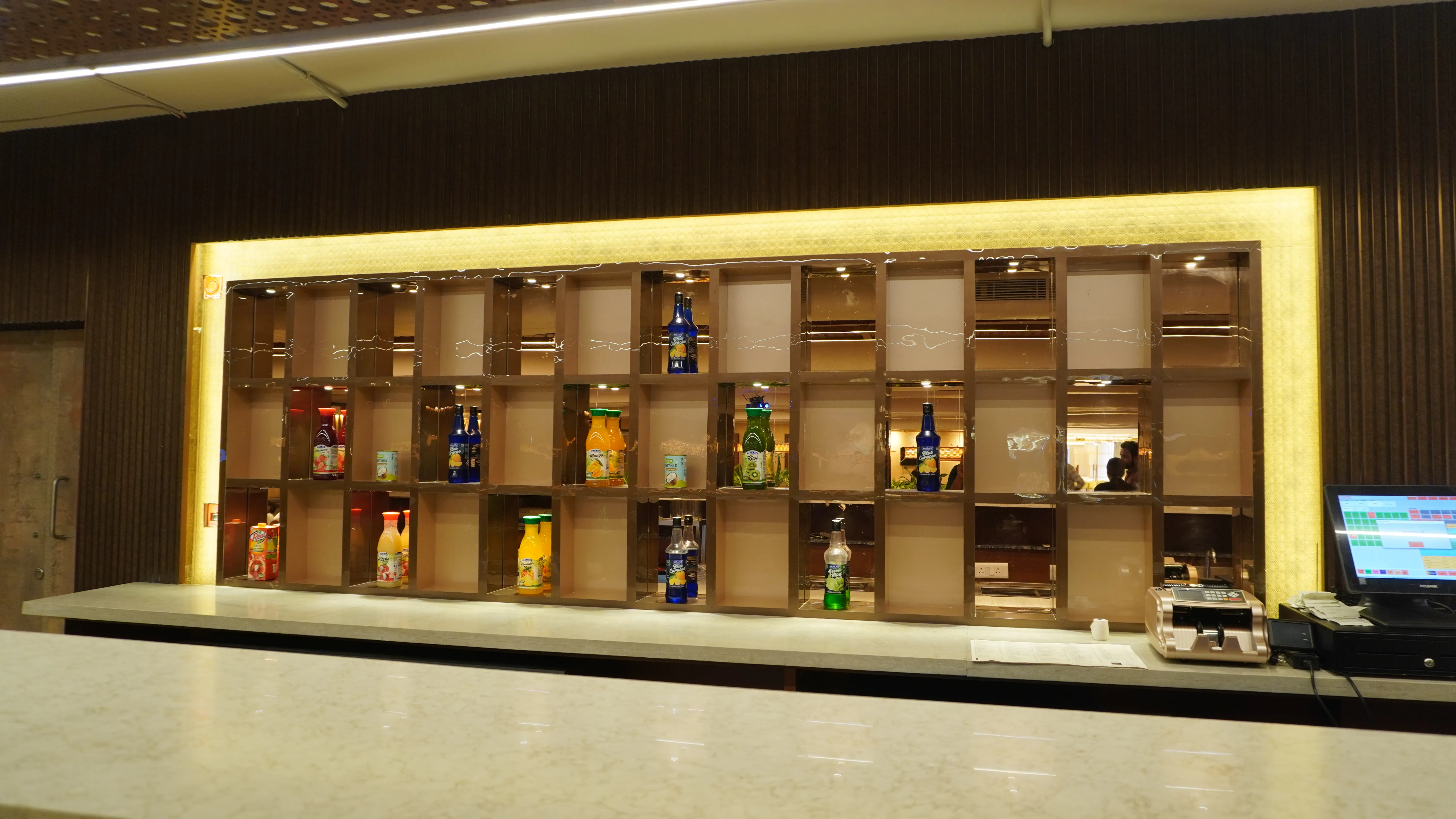 Horizontal image of a vibrant coral reef underwater with colorful fish swimming